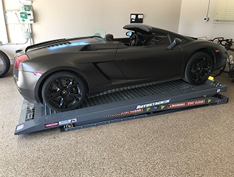 Lowered Autostacker with a Lambo in Home Garage